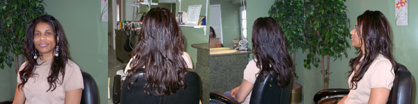Maureen, the head stylist, shows her long natural healthy hair.